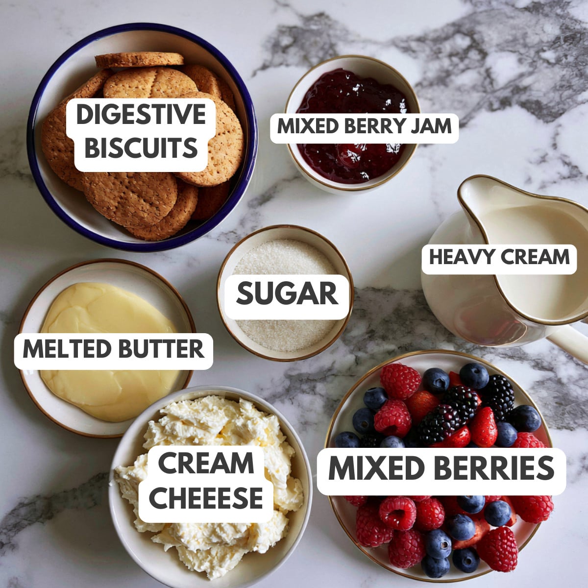 Digestive biscuits, jam, sugar, butter, cream, cream cheese and berries.
