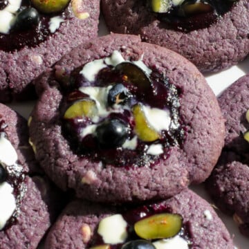 Blue berry cookie with melted white chocolate.