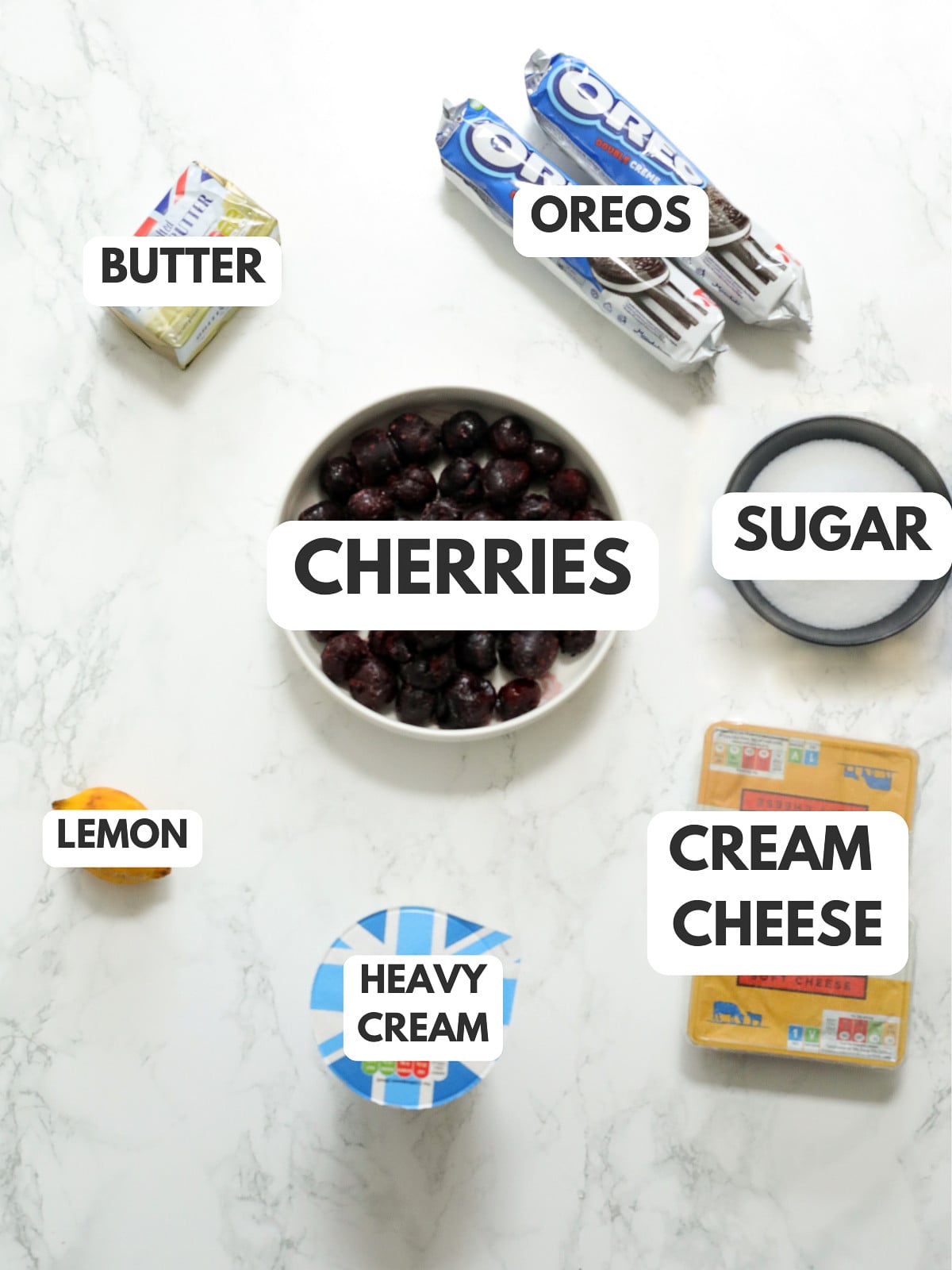 Heavy cream, butter, oreo, sugar, cherries, cream cheese and lemon.