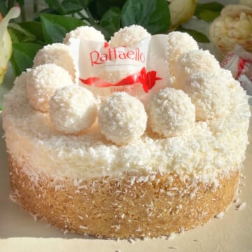 Raffaello cheesecake dessert on a board.